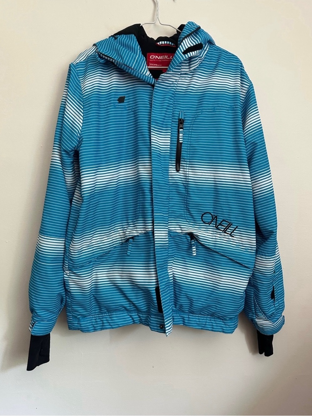 O'Neill Black Jacket with Blue and White Striped Accents and Red Logo